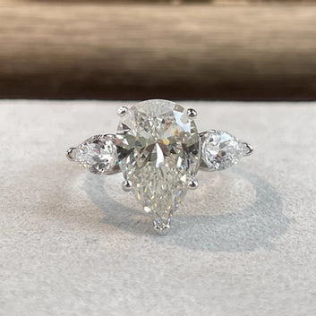 Water Drop Eternity Moissanite Ring (Pear Cut)